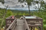 Large Open Deck with a 4- Person Hot Tub looking at the View 
